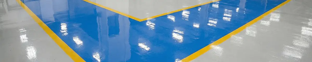 A factory floor professionally covered and marked with epoxy flooring in Birmingham, AL
