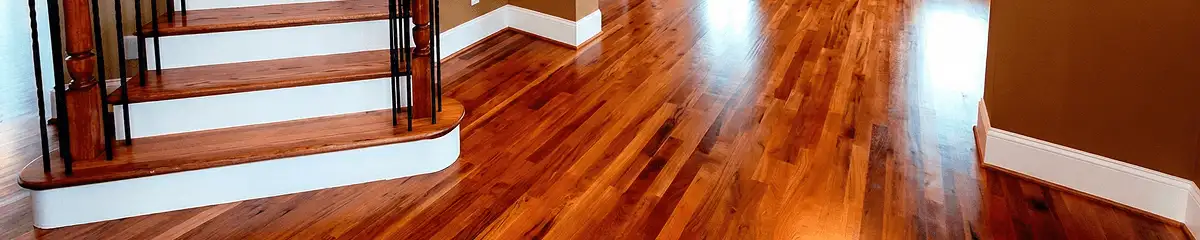 Base floor of a staircase with professionally restored wood flooring in Birmingham AL